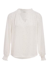 Blouse blanche à manches longues avec décolleté en V, motif à pois métalliques subtils, col froncé à volants et poignets élastiqués avec détails en volants.