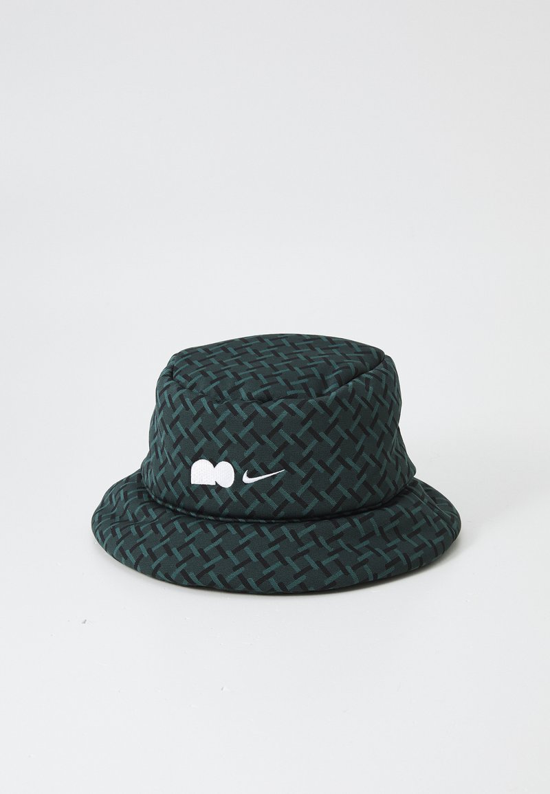 Bucket hat made of dark green patterned fabric, featuring textured woven design, embroidered white logo accents on the front.
