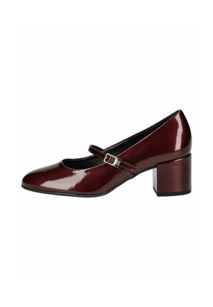 Chaussure Mary Jane en cuir verni bordeaux avec bout arrondi, bride réglable avec boucle argentée et talon bloc moyen.