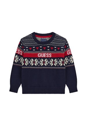 Pull en maille bleu marine avec des motifs géométriques et floraux rouges et blancs, avec le texte "GUESS" sur la poitrine et les manches.