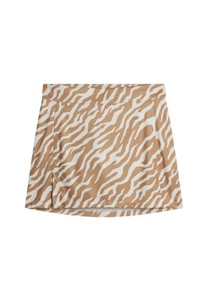Tan skirt with a white zebra stripe pattern, made from smooth fabric. Features a flat waistband and a flared hem for ease of movement.
