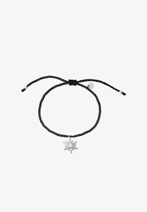Črni pleteni kabelni zapestnica s srebrnim sončnim amuletom. Zapestnica ima nastavljive vrvice za prilagoditev velikosti. Preprost, minimalističen dizajn.