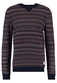 Stickad tröja med marinblå bas och flerfärglade horisontella ränder och mönster. V-ringad design med ribbade muddar och nederkant.