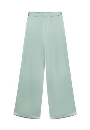 Weit geschnittene Hose in hellem Pastellgrün mit hohem elastischem Bund und subtiler vertikaler Struktur, flach auf weißem Hintergrund gelegt.