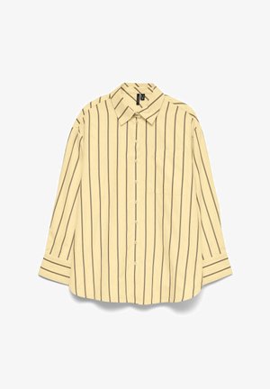 Šviesiai smėlio spalvos ilgomis rankovėmis marškiniai su juodomis vertikaliomis juostomis, su smailiu apykakliu ir kišenėle kairėje krūtinės pusėje.