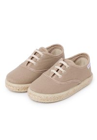 Beige canvas children's shoes with laces and woven-texture rubber soles, shown side by side on a white background.
