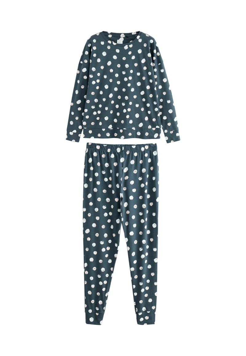 Twee-delig pyjama set in donkerblauw met witte stippen. Langsleeve top en elastische taillebroek van zacht, comfortabel materiaal.