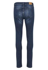 Tumedat sinised kitsad teksad sujuva denimitekstuuriga, millel on keskmise kõrgusega vöökoht ja kaks taga olevat taskut, millel on peened õmblusdetailid.