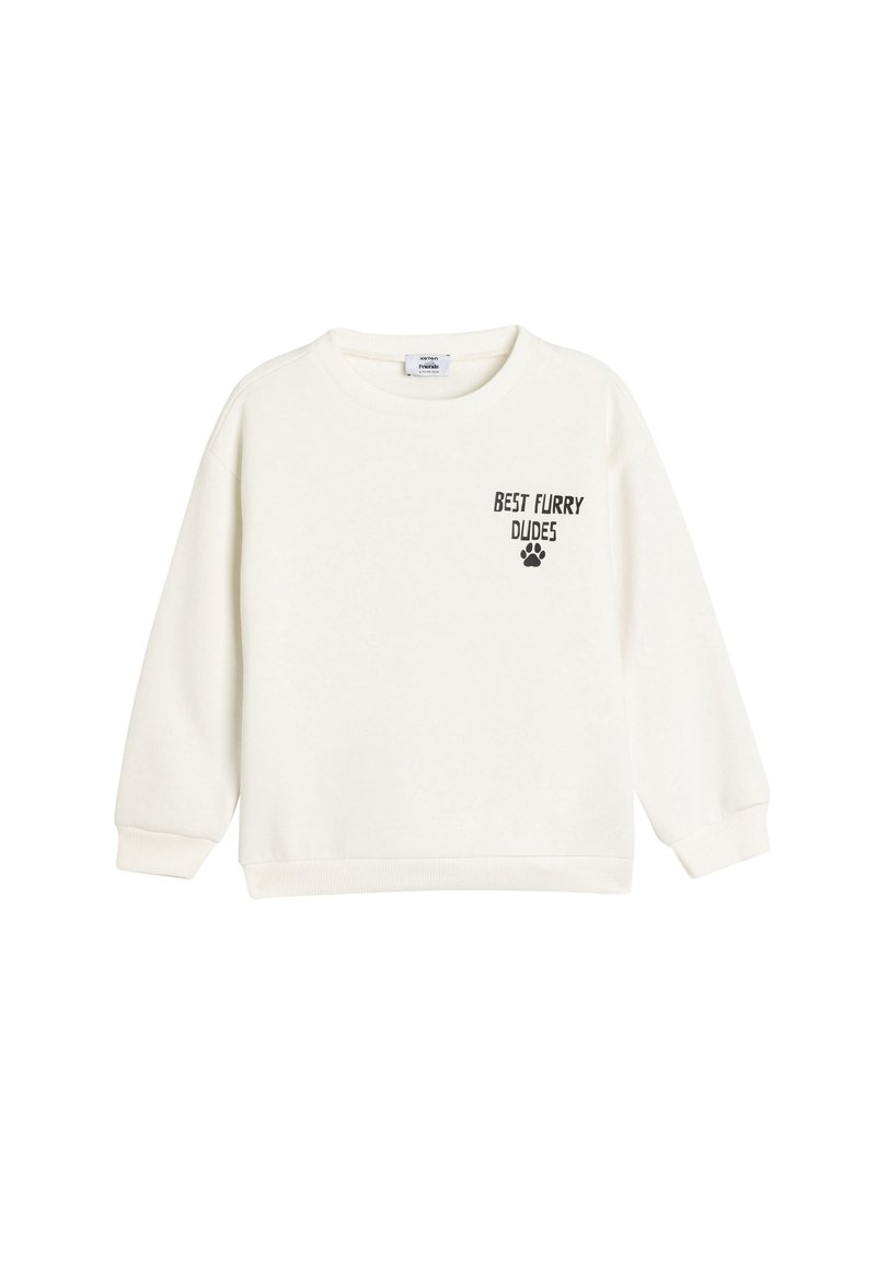 Sweatshirt blanc à manches longues, col rond, avec un texte imprimé noir disant "MEILLEURS POTES POILUS" accompagné d'une empreinte de patte.
