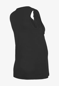 Top de maternidade preto em algodão suave, com um corte descontraído, decote redondo e detalhes em renda nas cavas para um toque adicional de textura.