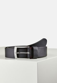 Black leather belt with a silver rectangular buckle and a red accent. Features a smooth texture and a flat, wide design.