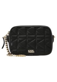 Borsa a tracolla in pelle trapuntata nera con tracolla a catena dorata e piastra con logo. Forma rettangolare con cuciture a motivo a diamante.