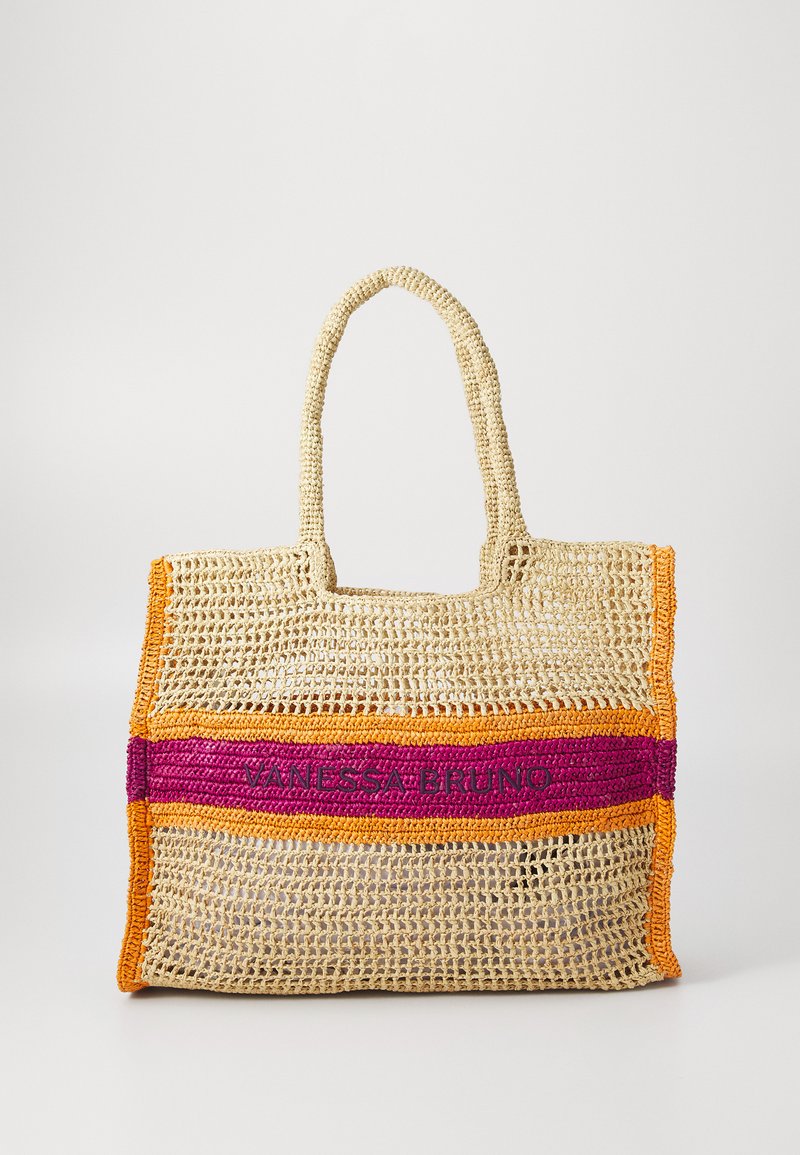 Bež heegeldatud kott oranžide äärte ja keskel magenta riba, millel on suurte tähtedega brodeeritud "Vanessa Bruno".