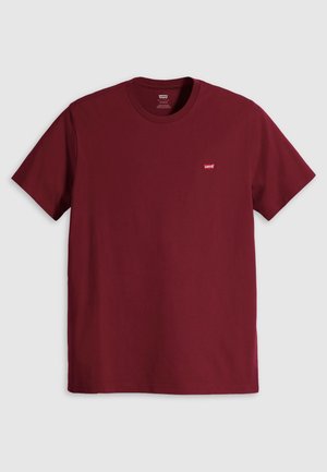 Burgunderfarget bomulls-T-skjorte med rund hals og korte ermer. Har en liten rød Levi's-logo på venstre brystområde.