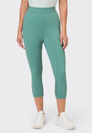 Schmeichelnde capriblaufarbene Leggings aus elastischem Material mit hohem Bund, Mesh-Akzenten am Saum und Flachnähten für mehr Komfort.