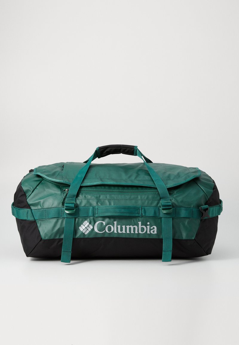 Duffle bag with green and black waterproof material, featuring dual handles, adjustable straps, top zip closure, and Columbia logo on the side.