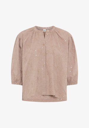 Lichtbruine blouse met lange mouwen, ronde hals, knopen aan de voorkant, subtiele bloemenborduursels en verspreide pailletten.