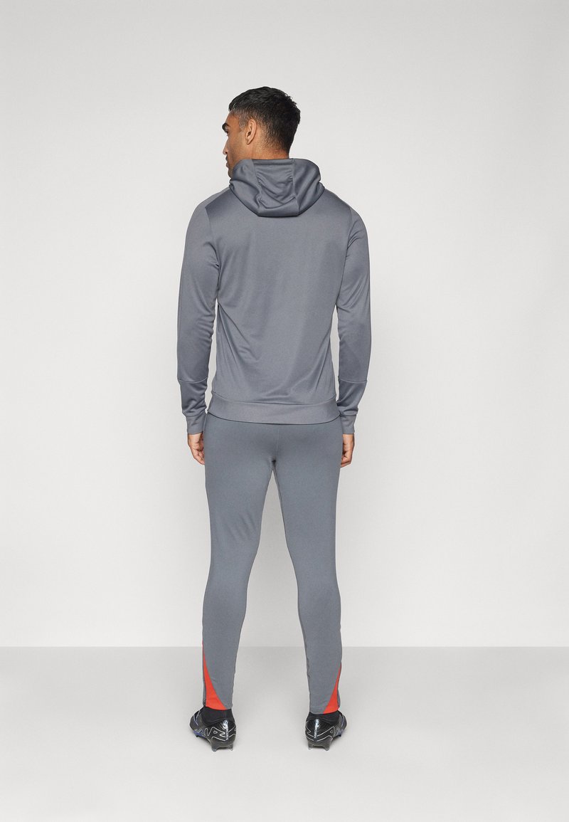 Nike Performance STRIKE PANT - Tréningruha alsók - iron grey/dragon red/white