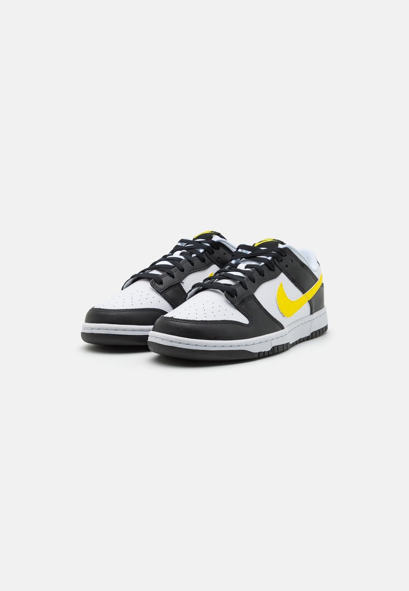 yellow black and white nike dunks