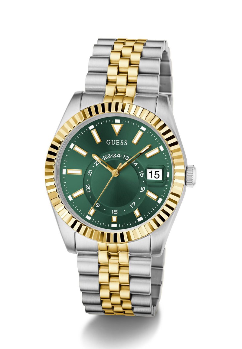Montre en acier inoxydable argent et doré avec un cadran vert, index horaires surélevés, affichage de la date et une lunette rotative texturée.