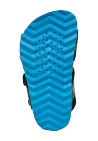 Suela de zapato de goma azul con un patrón de zigzag y agujeros de ventilación, con la palabra “GEOX” estampada en todo su diseño.