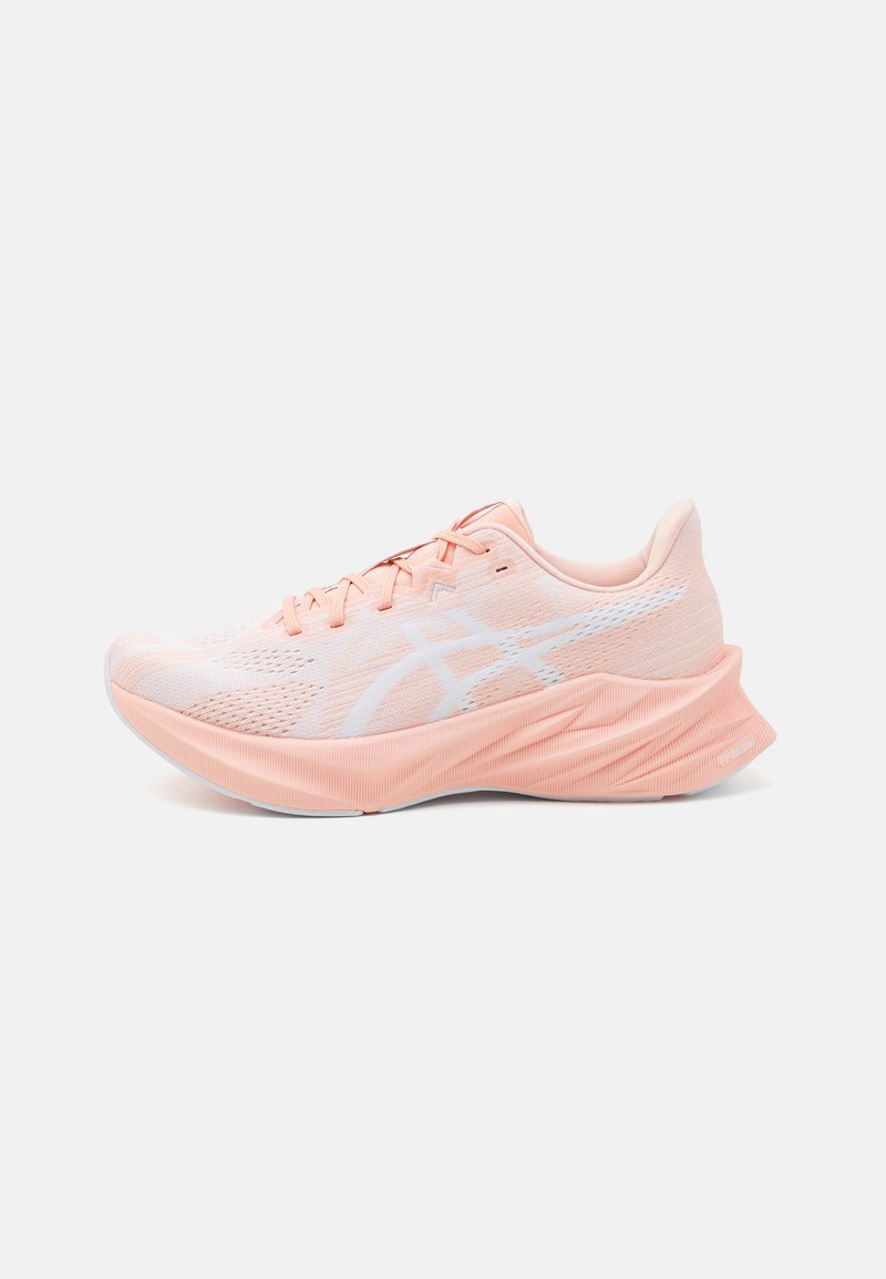 Lightweight running shoe in peach color with a textured mesh upper, white accents, and a thick sole for cushioning and support.
