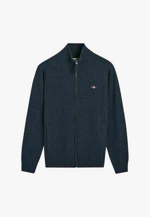Donkerblauwe hoodie met ritssluiting, voorzien van een geribde kraag, manchetten en zoom, en met een klein geborduurd GANT-logo op de linker borst.