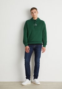 Lacoste SUBTLE LOGO UNISEX - Felpa con cappuccio - green
