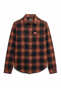 Punainen ja musta ruudullinen flanelli-paita, pitkät hihat, nappimalli, jossa on kaksi rintataskua ja pieni logopatchi.