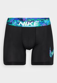 Zwarte sportshorts met een kleurrijke, gedessineerde tailleband. Prominent wit Nike-logo aan de linkerkant. Gemaakt van rekbaar materiaal.