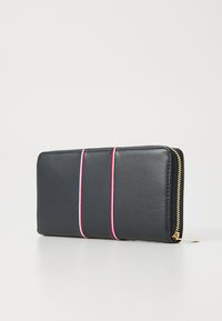 Black leather wallet with gold zipper, featuring three vertical stripes in red and white. Smooth texture, rectangular shape, minimalist design.