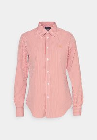 Red and white striped button-up shirt with long sleeves, featuring a pointed collar and small logo on the chest. Plain fabric with smooth texture.