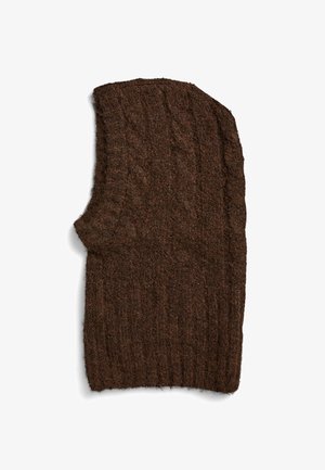 Brun strikket vest med et struktureret stof, der har ribbet mønster og en rund halsudskæring. Designet er uden ærmer og let oversized.