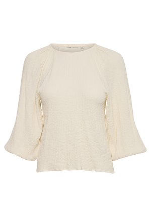 Roomkleurige blouse met een textuur, brede driekwart mouwen en een ronde halslijn.