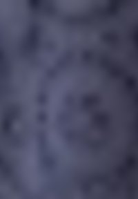 Formes circulaires floues dans des tons bleu foncé et gris, sans objets ni personnes distincts visibles.