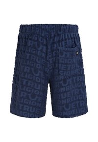 Navy blue terry cloth shorts with elastic waistband, embossed "True Religion" text pattern, and a small back pocket with logo tag.