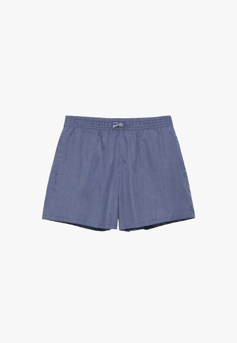 Boxers pour hommes à carreaux bleus et blancs avec ceinture élastique et petite étiquette frontale.