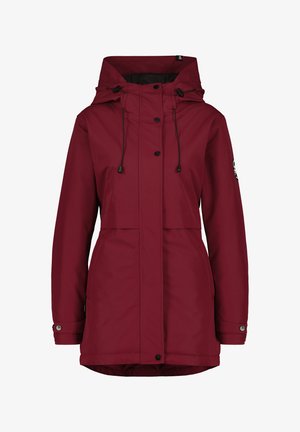 Giacca impermeabile color bordeaux con cappuccio regolabile, chiusura frontale a bottoni e due tasche laterali. Presenta dettagli neri e una texture liscia.