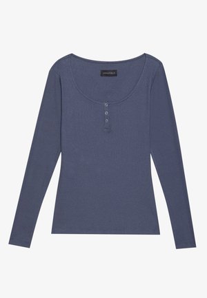 Langslachtig, geribbeld topje in donkerblauw met een ronde halslijn en een drie-knops sluiting aan de voorkant. Zachte textuur, slim fit.