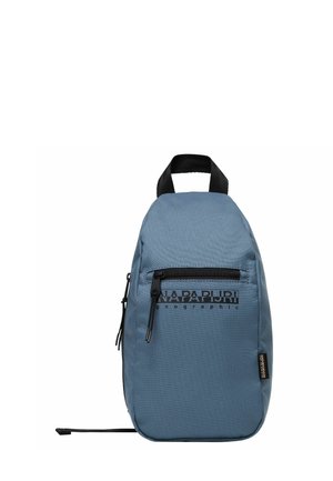 Zaino di tessuto blu con una texture trapuntata, tasca frontale con zip e stampa del logo nera. Presenta una maniglia superiore e spallacci regolabili.