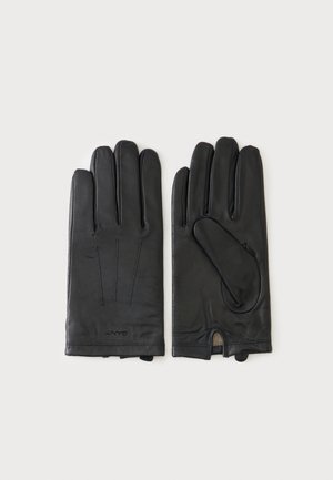 Een paar zwarte leren handschoenen, één met de achterkant met decoratieve stiksels, de andere toont de palm met duimdetail en een kleine opening.