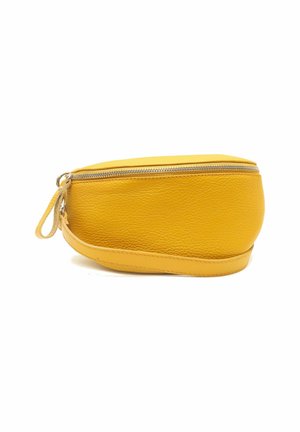 Pochette en cuir jaune avec une surface texturée, de forme ronde, fermeture éclair et une petite anse sur le côté.