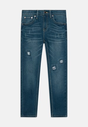 Jeans in denim blu scuro con una vestibilità slim, caratterizzati da dettagli strappati, leggera scoloritura e stile classico a cinque tasche.