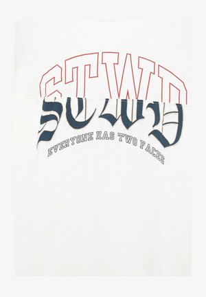White T-shirt with bold graphic text. Top text in red reads "STWD," while the lower navy text states "Everyone Has Two Faces." Soft fabric.