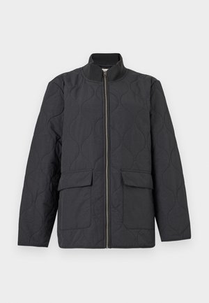 Quilted dark gray jacket with a high collar, front zipper, and two flap pockets. Features a textured pattern throughout the fabric.