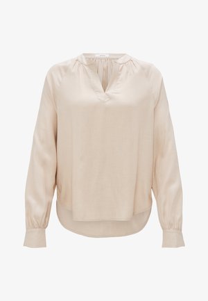 Beige Bluse mit langen Ärmeln, V-Ausschnitt und gefalteten Details. Aus glattem Stoff, mit gerüschten Schultern und abgerundetem Saum.