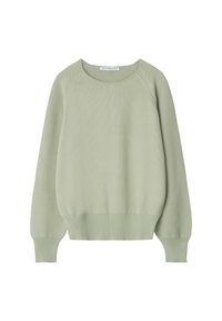 Jasnozielony dziergany sweter z okrągłym dekoltem, rękawami raglanowymi oraz ściągaczami na mankietach i dole. Miękka faktura, luźny krój.