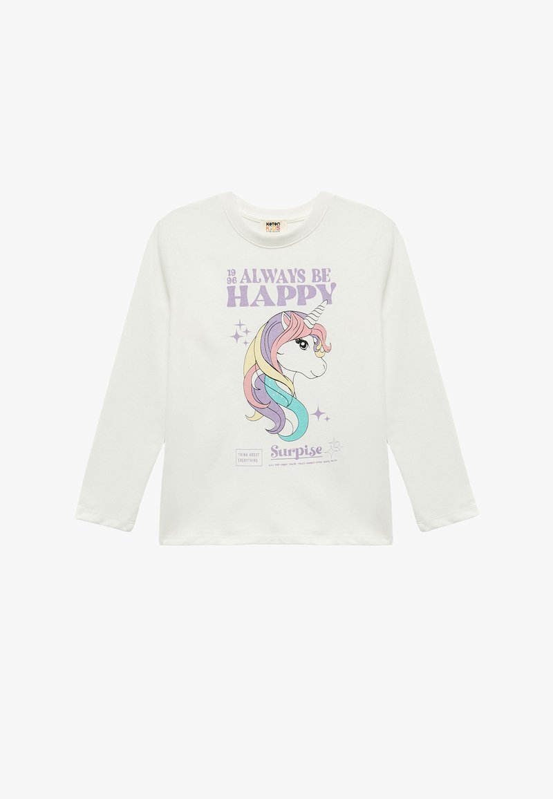 Camicia bianca a maniche lunghe con grafica di un unicorno, criniera arcobaleno pastello, testo "Sii Sempre Felice" e logo del marchio in basso.
