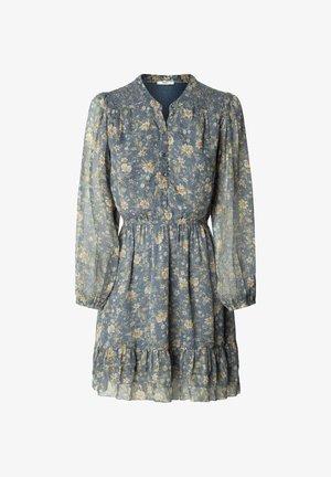 Květinové šaty v modré barvě, s dlouhými rukávy, zapínáním na knoflíky vpředu, smockovaným výstřihem a volánkovým lemem. Vyrobené z lehké, texturované tkaniny.