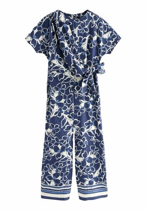 Tuta floreale navy con motivi di fiori bianchi, maniche corte, vita con laccetto e dettagli a righe sull'orlo. Realizzata in tessuto leggero.